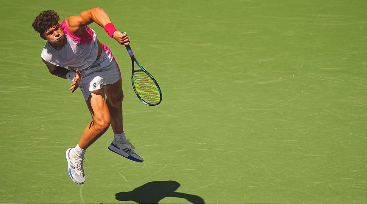 Ben Shelton serves at the U.S. Open.